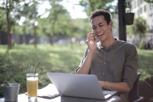 Man on phone while working